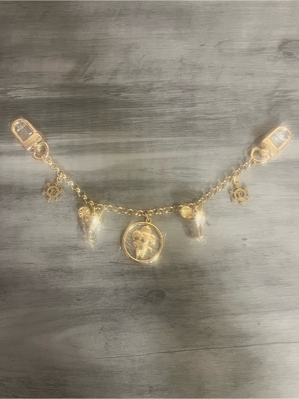 Gold-Tone Bag Chain Charm with Floral Medallion